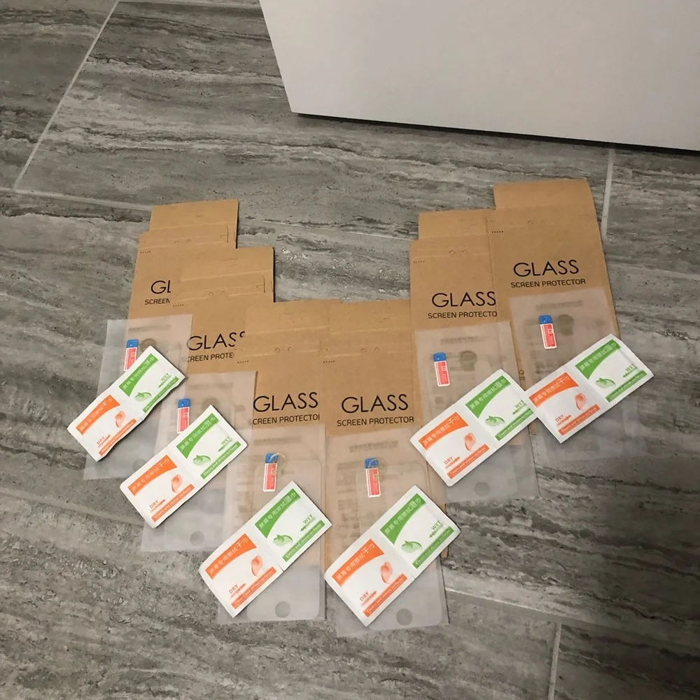 Six pack of iPhone 5s glass screen protectors with wipes to clean phone & screen